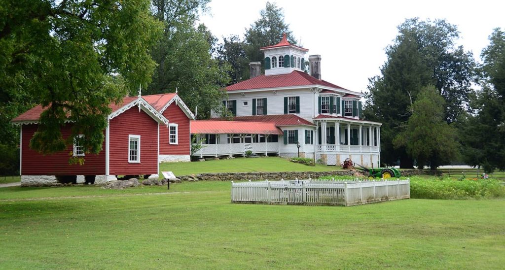 Wide shot of the mansion at Hardman Farm.