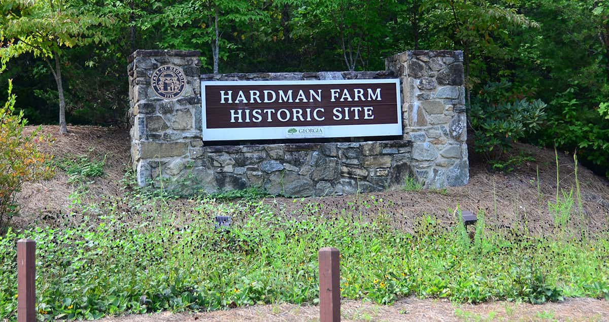 The front entrance sign to Hardman Farm State Historic Site.